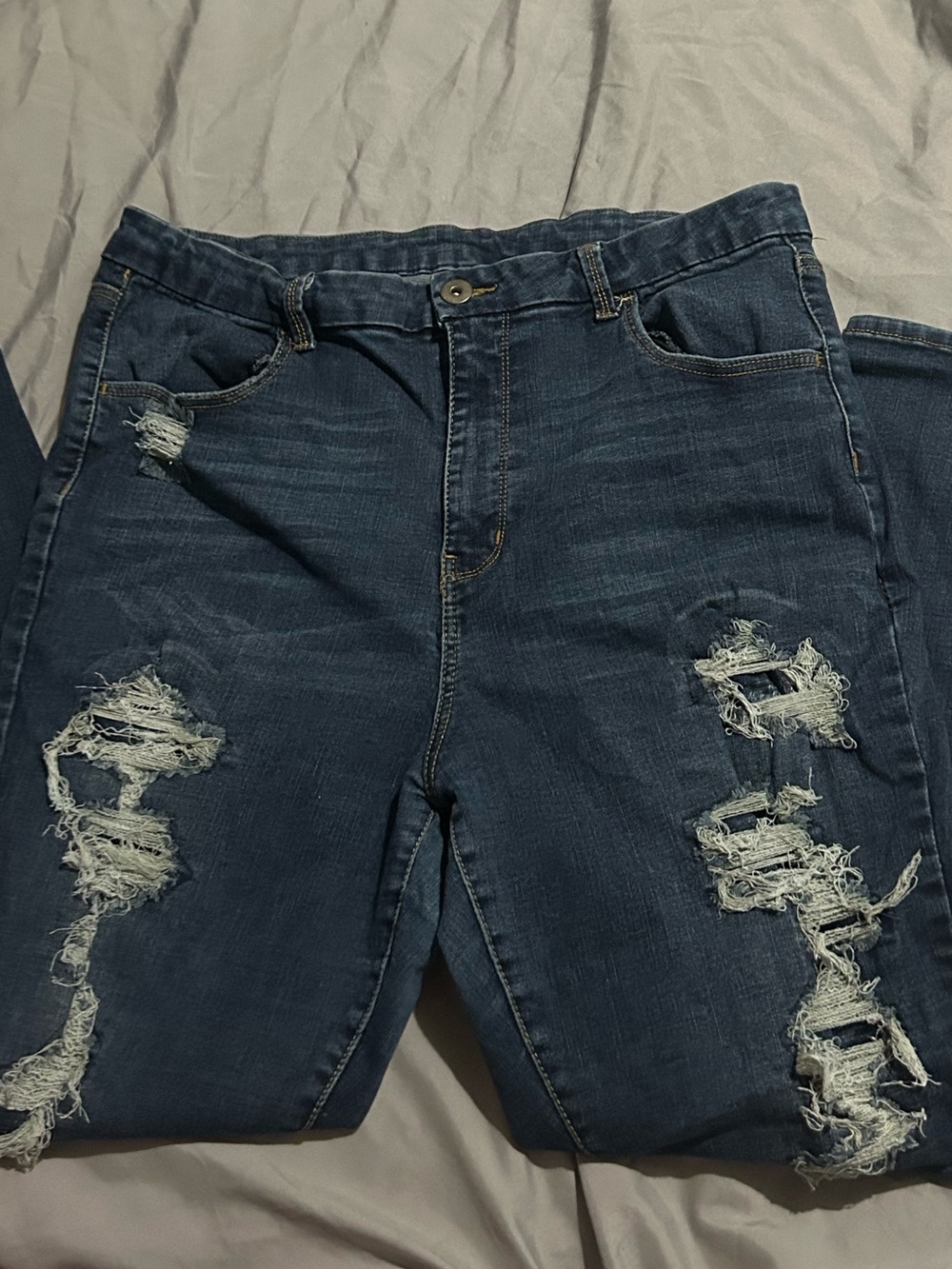 Distressed Women's Blue Denim Jeans